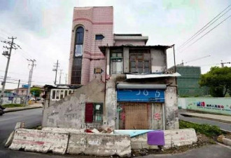 上海“最牛钉子屋”搬空 获赔4套房+230万元
