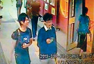 香港标语肇事者被曝光 两男子犯案后边走边笑