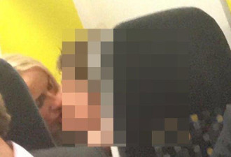 英女教师在火车上坐未成年男学生腿上亲吻猥亵
