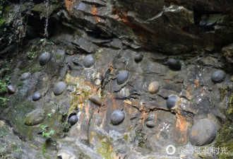 贵州有个神奇石崖会“下蛋” 每三十年一产