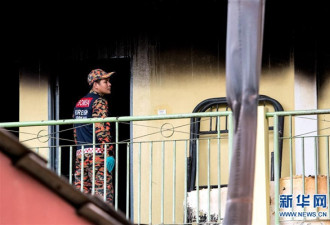 马来西亚致23死火灾7人被捕 疑因口角纵火报复