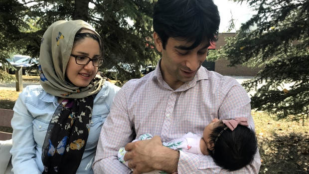 Zahra (Mona) Deghanifard with her husband, Mohsen Andayesh, and their daughter, Dabi.