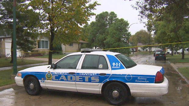 Cadets and members of Manitoba's Independent Investigation United had a section of Madrigal Close cordoned off Sunday. An officer was stabbed and a man was fatally shot by police in a home on the street, police said.