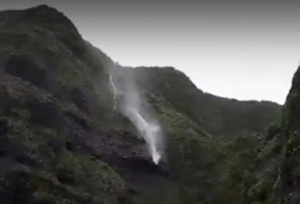 台风“卡努”来袭中国沿海 瀑布被吹得倒流