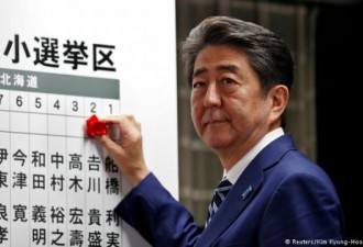 日本国会大选 日本式的冷静:安倍稳获连任