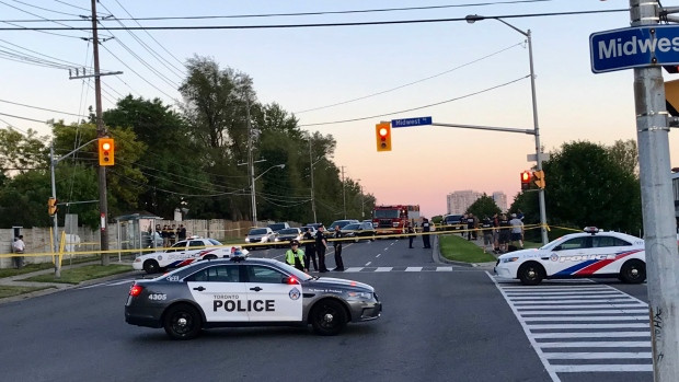Police vehicles are pictured at the scene of a shooting near Midland Avenue and Midwest Road Tuesday June 25, 2019. (Jason Hiscox)