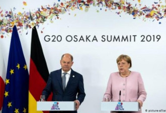 默克尔暗批川普很“孤立，”G20通过联合声明