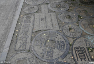 郑州现土豪街道 人行道铺满古货币