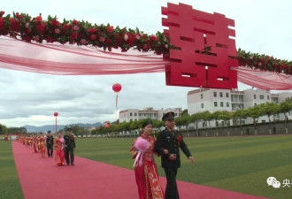 火箭军99对新人集体婚礼 为何“大操大办”