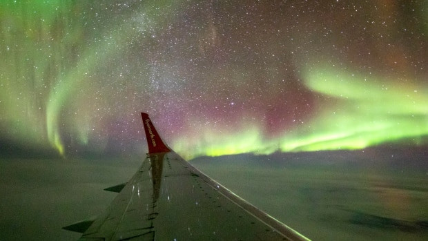 The northern lights dance across the sky above Yukon.