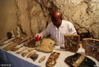 埃及考古人员发现新墓穴 出土新款木乃伊