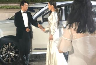 郎朗贴心为娇妻整理裙子 吉娜颜值超高S型身材