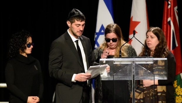 Jonathon Sherman cries as he speaks during a memorial service for his parents Barry and Honey Sherman, as his sisters look on, in Mississauga, Ont., on Thursday, December 21, 2017.