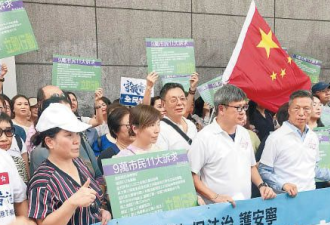 香港9万人怒吼促查暴乱黑手：口罩党撕下假面