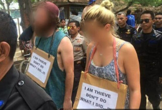 白人情侣在印尼被挂牌“我是小偷”游街示众