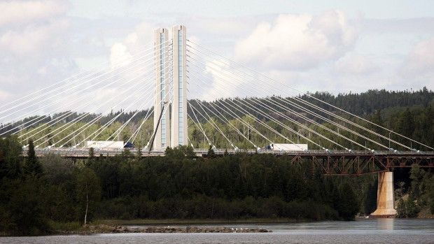 The Nipigon River bridge carrying part of the Trans-Canada Highway near Nipigon, Ont. Repairs to the bridge in northwestern Ontario will take nearly three years and delays have pushed the total cost well beyond the initial $8 million to $12 million estimate.