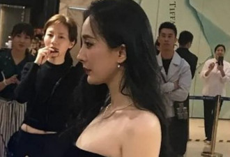 杨幂穿抹胸短裙出席活动全程板脸 变身冷艳御姐