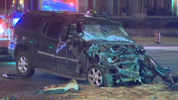 A man in his 30 was seriously injured in a crash between a dump truck and a minivan early Saturday, Toronto police and paramedics say.
