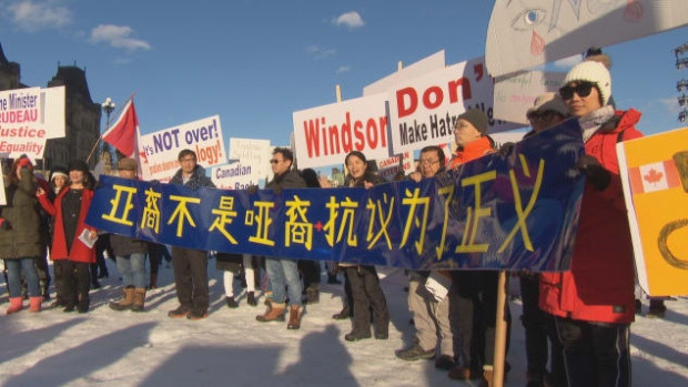 Members of the Chinese-Canadian community attend a rally on Parliament Hill on Feb. 18, 2018.