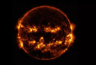 NASA公布诡异太阳照 好大一个南瓜灯啊