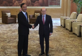 国台办主任刘结一在上海会见新北市市长朱立伦