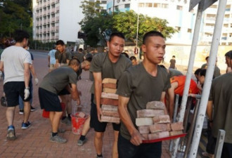 中国驻港部队清扫街道被批违反宪法