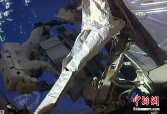 国际空间站宇航员太空行走 持续6个小时