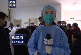记者探访武汉发热门诊 亲身体验穿戴隔离防护服