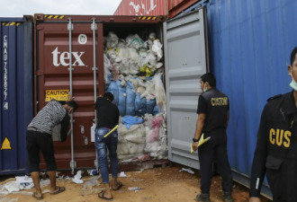 马来西亚将退回加拿大垃圾15 个集装箱