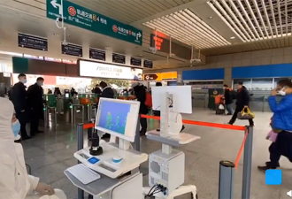 上海火车站测温：一秒测一人,每名旅客都要测