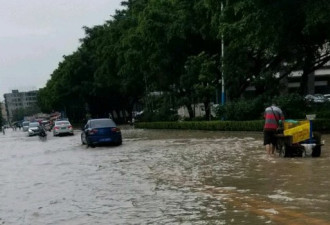 广东暴雨致行人触电身亡 市民问责市政建设