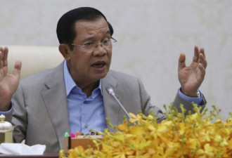 柬埔寨：不许戴口罩 不停直航 不撤侨