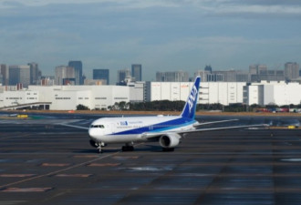 日本首架撤侨专机返抵羽田机场 多人发烧、咳嗽