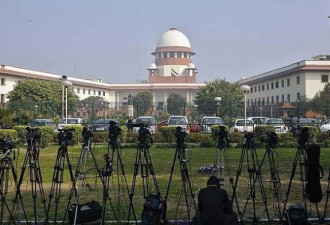 印度法院6人感染H1N1病倒 法官戴口罩上班