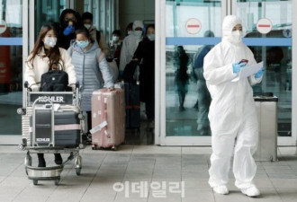 确诊人数不断暴增 韩国人终于戴起了口罩