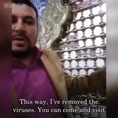 伊朗民众争相舔墙称并不害怕病毒