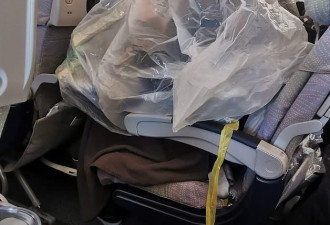 意大利起飞的航班上中国女子头套塑料袋吃饭