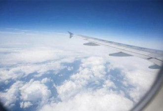 小伙坐飞机拍照，拍到有群人在天上旅行