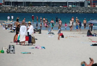 游客随升温涌入，澳洲海滩或将关闭