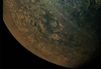 NASA发布超清晰木星照 唯美缥缈似梵高名画