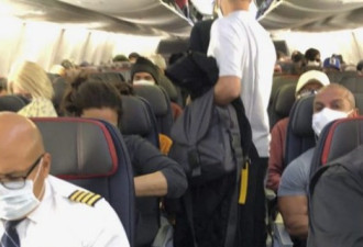 美国内航班拥挤满员 一半人没戴口罩