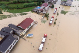 中国南方洪灾波及三千万人 三峡大坝泄洪遭质疑