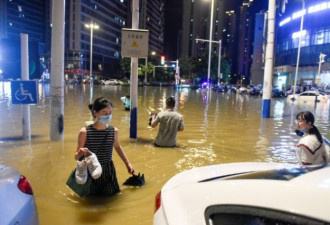 中国南方持续暴雨酿罕见洪水 多人遇难损失惨重