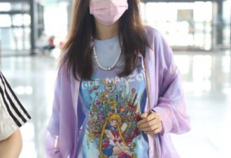 李小璐与神秘男子现身机场？男方腿有纹身