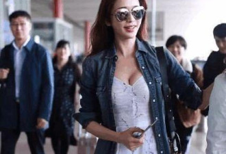 林志玲机场亮相！不系纽扣高调“晒”事业线！