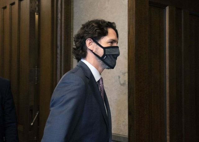 加拿大总理杜鲁多在�案期间的动作有限，其“对加拿大的司法系统有信心”的发言也令外界印象深刻。（美联社）