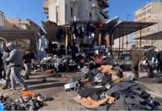 伊拉克自杀式连环爆炸袭击死亡人数升至32人