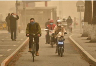 强沙尘暴袭击中国北方 北京城区污染严重