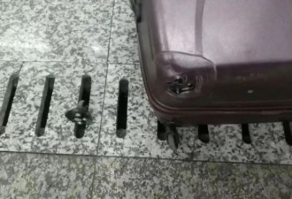 女子带娃到上海旅游行李箱拖坏 竟要地铁站赔新