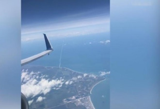 独特视角 乘客在飞机上拍到火箭升空罕见画面